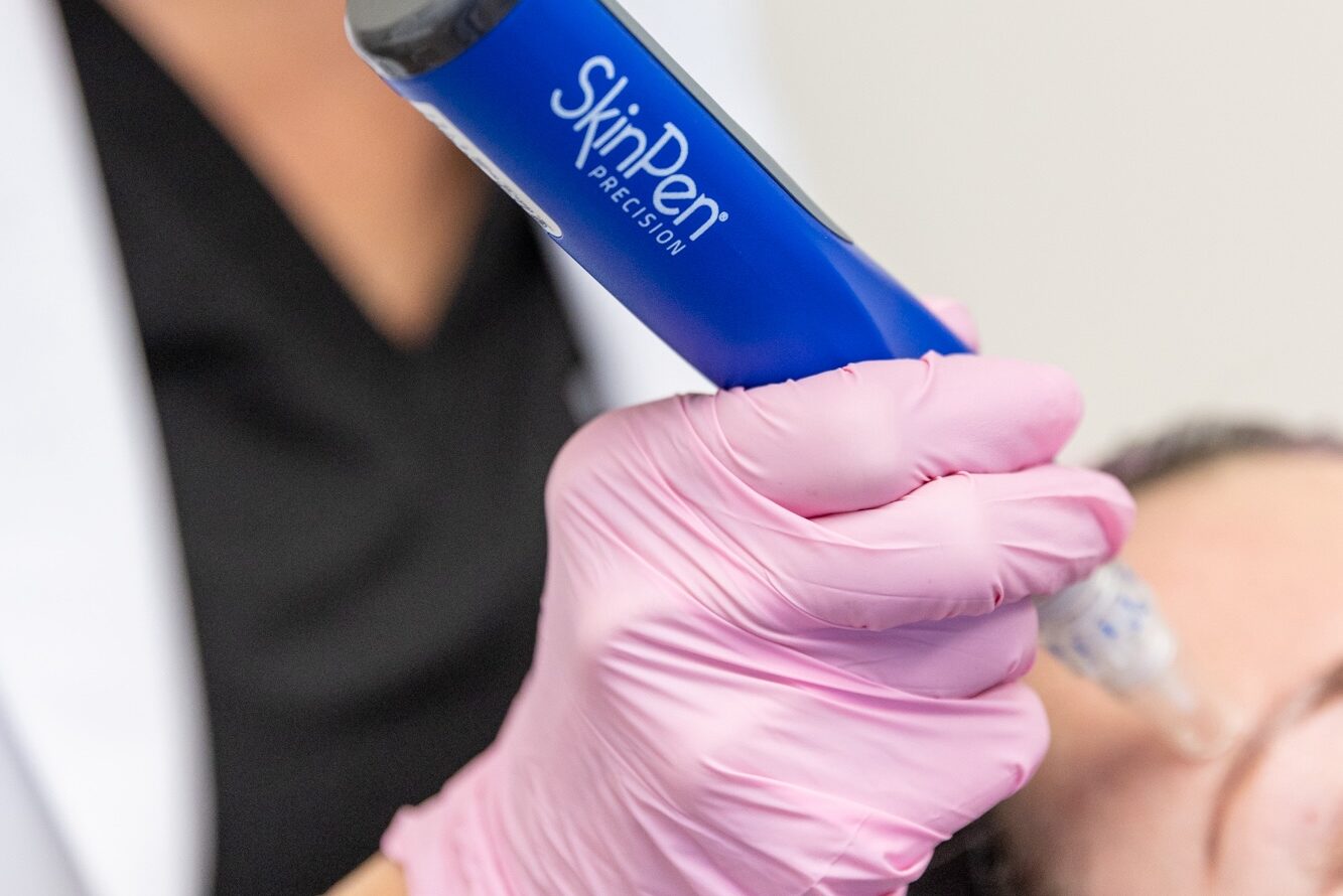 A provider uses the SkinPen device during microneedling with PRP in Freeport.