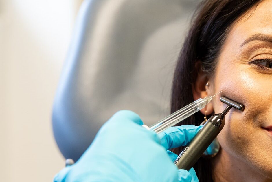 A licensed provider precisely administers a patient's dermal fillers in Beloit.